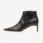 Left side view of black flame ankle boot on white background, with no model shown.