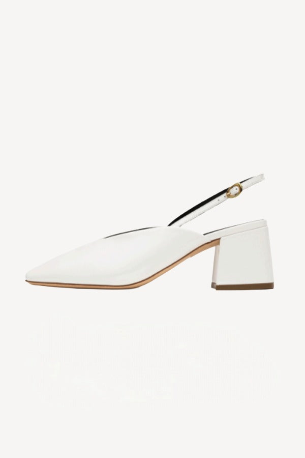 Right side view of off white marquito block heel on white background, with no model shown.