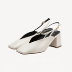 Pair view off white marquito block heel on white background, with no model shown.