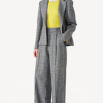 Front view of Grigio Fantasia Bogart Wool/Silk Trousers on model wearing matching blazer with yellow sweater, against a white background.