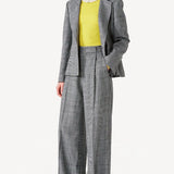 Front view of Grigio Fantasia Bogart Wool/Silk Trousers on model wearing matching blazer with yellow sweater, against a white background.