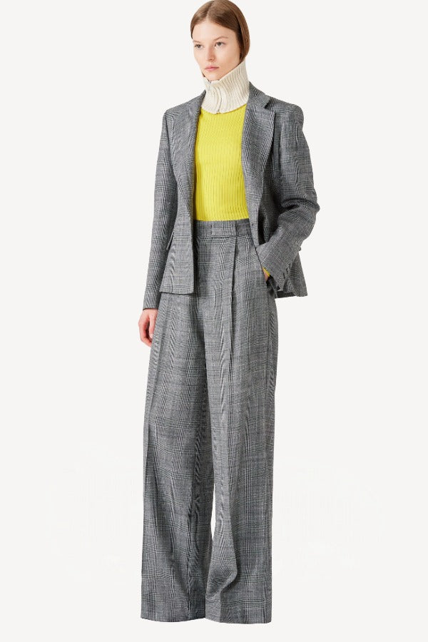Front view of Grigio Fantasia Bogart Wool/Silk Trousers on model wearing matching blazer with yellow sweater, against a white background.