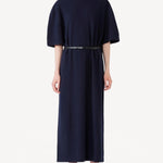 Front view of cielo cashmere long t-shirt dress on model wearing red heels, against a white background.