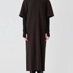 Alternate front view of brown cashmere long t-shirt dress on model wearing boots, against a white background.