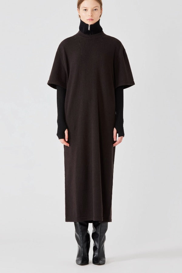 Alternate front view of brown cashmere long t-shirt dress on model wearing boots, against a white background.