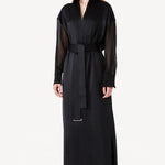 Alternate front view of black francesca dress on model wearing heels, against a white background.