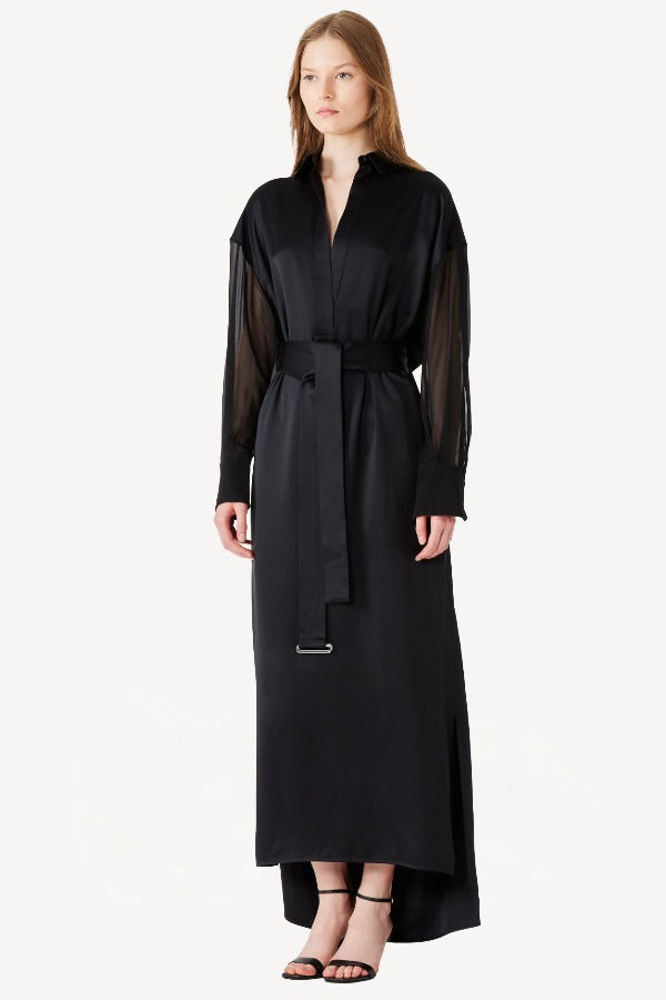 Alternate front view of black francesca dress on model wearing heels, against a white background.