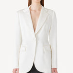 Front view of L/S double satin andrea blazer jacket on model wearing black skirt, against a white background.