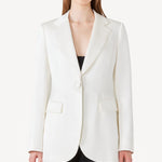 Alternate front view of ivory l/s double satin andrea blazer jacket on model wearing black pants, against a white background.
