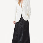 Alternate front view of ivory double satin andrea blazer on model wearing black skirt, against a white background.