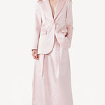 Front view of pink duchesse silk andrea blazer on model wearing pink skirt, against a white background.