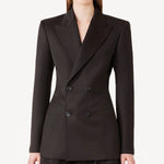 Front view of brown l/s wool double breast tuxedo jacket on model wearing brown pants, against a white background.