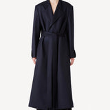Front view of navy l/s wool lauren trench coat on model wearing black pants, against a white background.