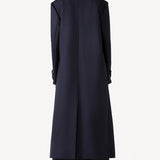Back view of navy l/s wool lauren trench coat on model wearing black pants, against a white background.