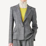Front view of grigio fantasia wool petit blazer on model wearing grigio pants, against a white background.
