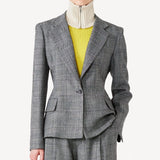 Front view of grigio fantasia wool petit blazer on model wearing grigio pants, against a white background.