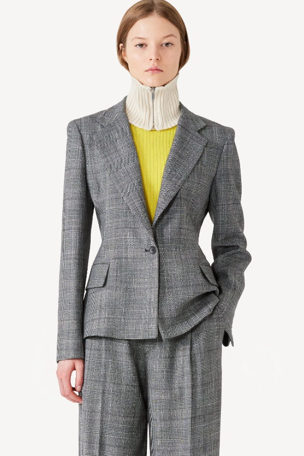Front view of grigio fantasia wool petit blazer on model wearing grigio pants, against a white background.