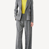 Front view of grigio fantasia wool petit blazer on model wearing grigio pants, against a white background.