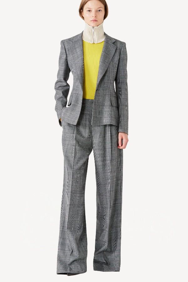Front view of grigio fantasia wool petit blazer on model wearing grigio pants, against a white background.