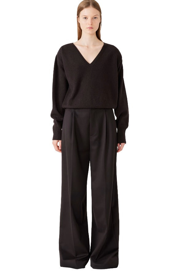 Front view of brown lavinia sweater on model wearing brown pants, against a white background.