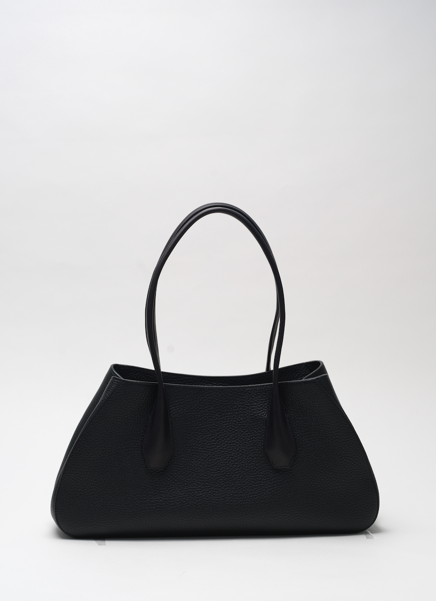 Black handbag on a white background