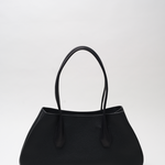 Black handbag on a white background