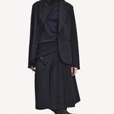 Front view of titan midnight cate jacket on model wearing black kilt and boots, against a white background.