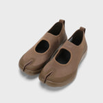 Front view of chocolate tabi sandals on white background, with no model shown.