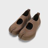 Front view of chocolate tabi sandals on white background, with no model shown.