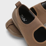 Back closeup view of chocolate tabi sandal on white background, with no model shown.