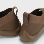 Back closeup view of chocolate tabi sandal on white background, with no model shown.