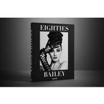 Front view of taschen david baileys eighties book on charcoal background.