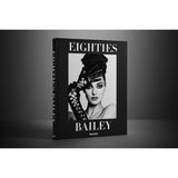Front view of taschen david baileys eighties book on charcoal background.