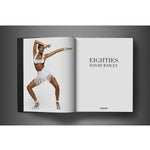 Open view of taschen david bailey eighties book on charcoal background.