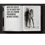 Open view of taschen helmut newton's Legacy book on black background.