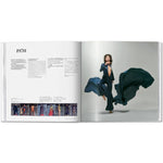 Open book view of taschen issey miyake on white background.