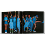 Open book view of taschen issey miyake on white background.