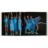 Open book view of taschen issey miyake on white background.