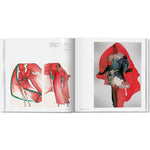 Open book view of taschen issey miyaki on white background.
