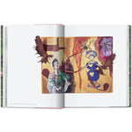 Open book view of taschen julian schnable book on white background.