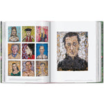 Open book view of taschen julian schnable book on white background.