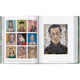 Open book view of taschen julian schnable book on white background.