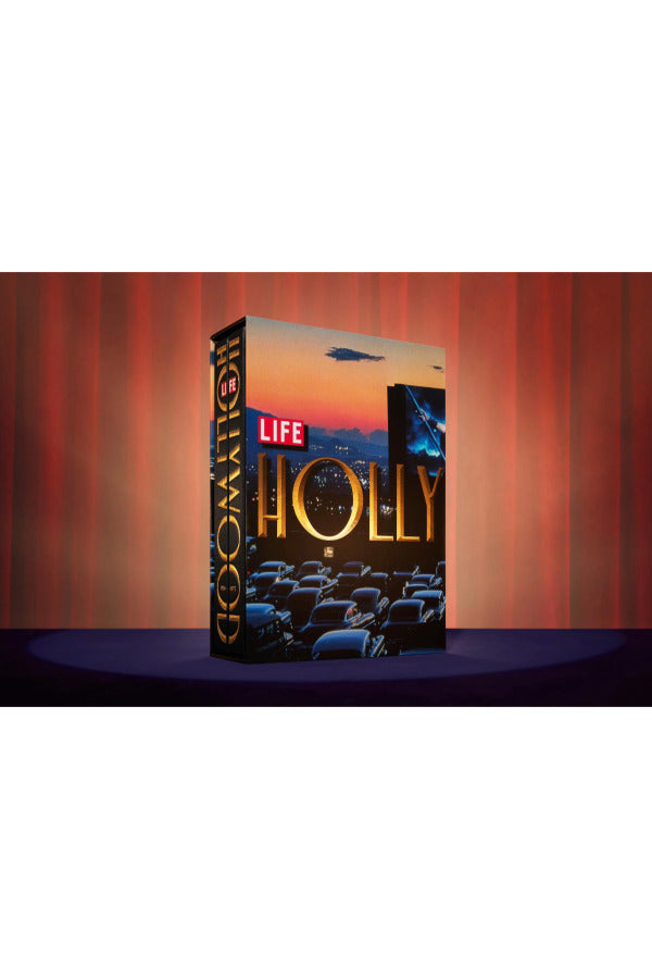 Front view of taschen hollywood book on red and blue background.