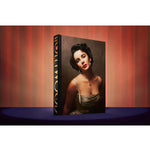 Front view of one book of taschen life hollywood on red and blue background.