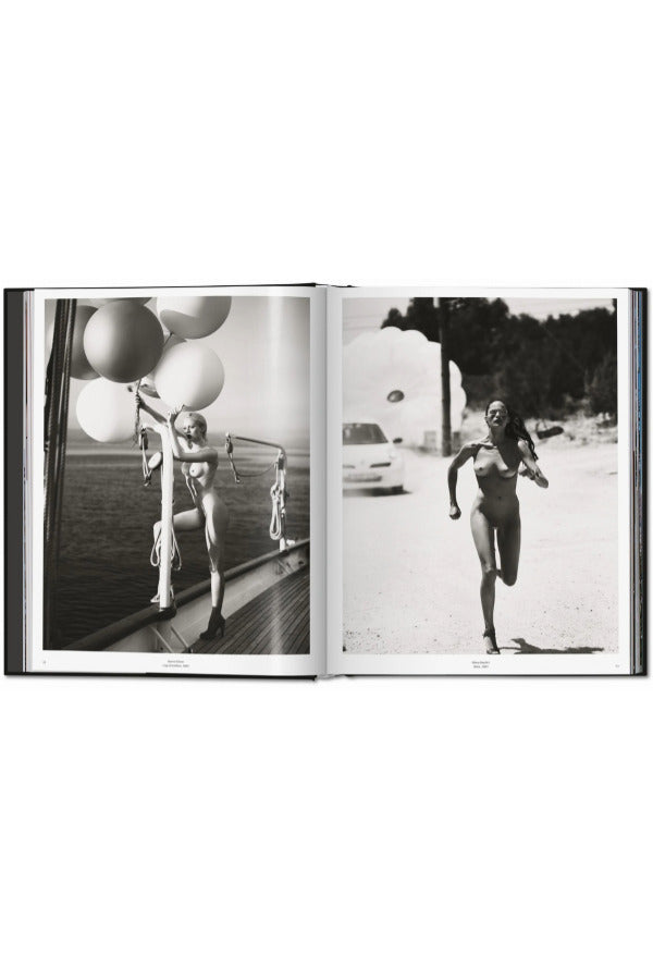 Open view of taschen mert tlas and marcus pigott book on white background.