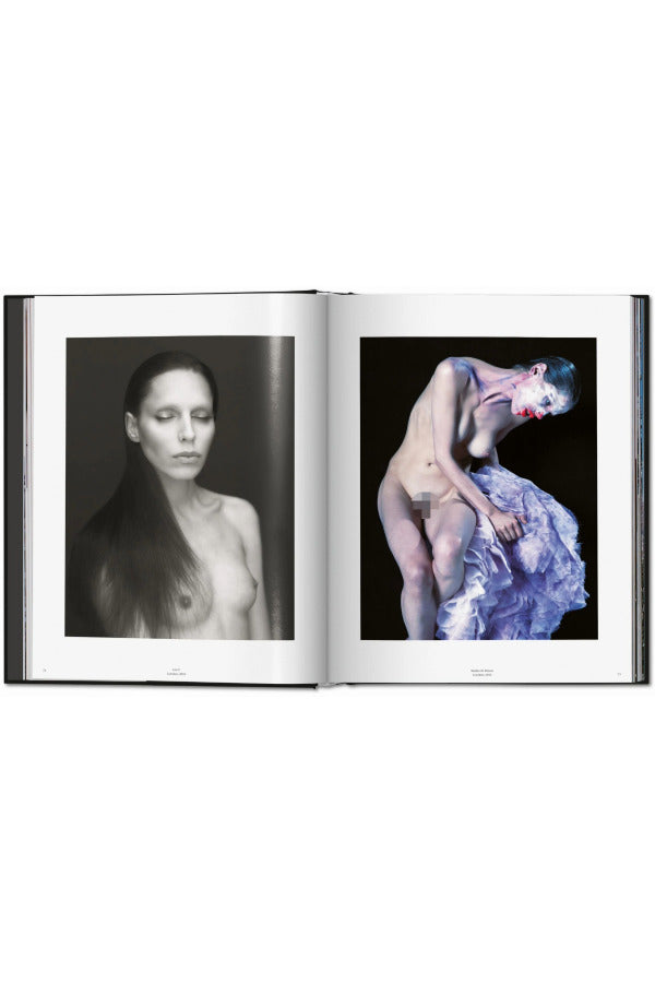 Open view of taschen mert atlas and marcus pigott book on white background.