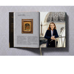 Open view of taschen national gallery paintings, people book on light colored tablecloth