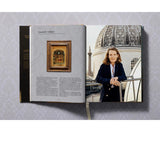 Open view of taschen national gallery paintings, people book on light colored tablecloth