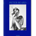 Front view of taschen peter beard book on white background.