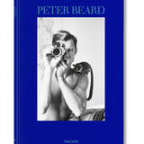 Front view of taschen peter beard book on white background.